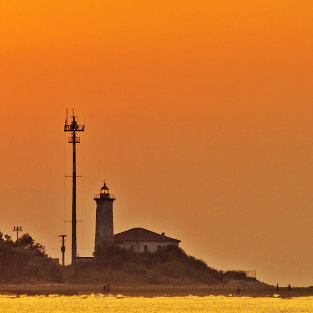 Light house in Bibione, Italy after sunrise